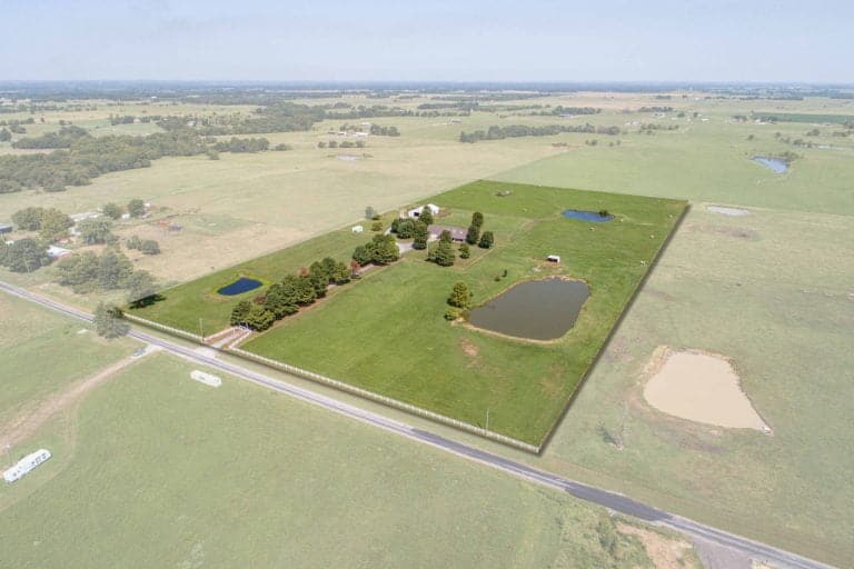 drone photo overlooking land with property outlined